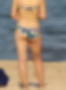 Blue floral bikini babe on the beach
