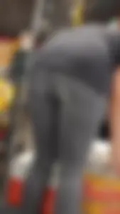 Slim clerk in tight grey jeans