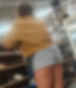 Cute girl showing cheeks off at the thrift shop