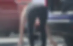 Redhead milf with a nice ass and vtl in leggings while loading her car