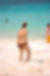 Assortment of sexy babes at the beach in bikinis