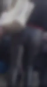 Milf shows off her shapely ass in her leather pants at the market