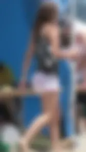 Bunch of sexy babes at the beach in bikinis