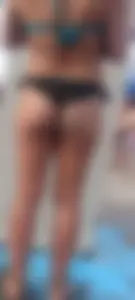 Beach shower milf in semi thong bikini with a nice ass