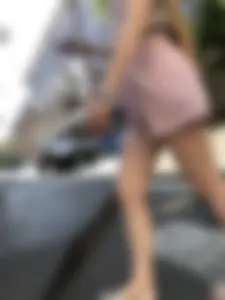 Cute candid girl in pink shorts street photos