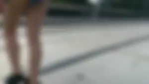 Girl walking in denim shorts showing some of her ass cheeks