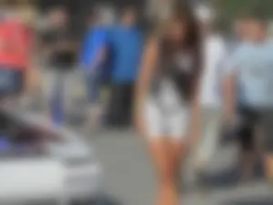 Car show models in sexy short outfits