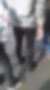 Girl wearing a black skirt over her leggings