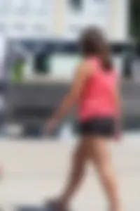 Thick girl in pink top and black shorts with vpl