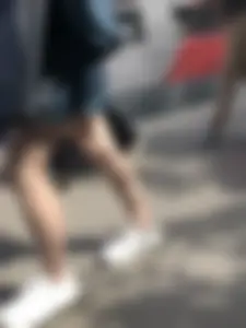 Cute candid girl in a dress at the train station