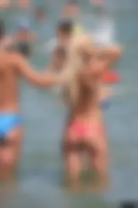 A bunch of sexy beach voyeur babes in bikinis, thongs and topless