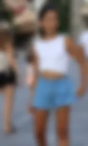 Skinny girl wearing shorts on the street
