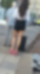Muscular Legs in Shorts on Pink High Heeled Shoes Street Creepshot