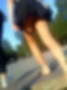 Street Candid Upskirt of a Girl Walking Up the Stairs with Panties Visible