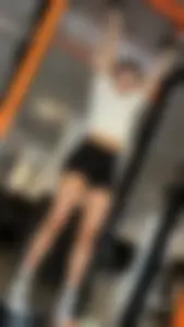 Hot tanned girl in gym with amazing legs and tight ass