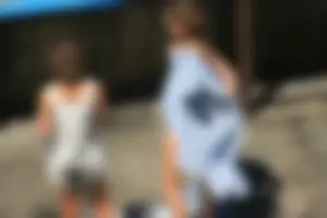 Two teens stripping and going topless to tan