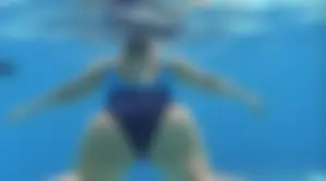 Mature Mexican lady in a swimsuit with a huge ass