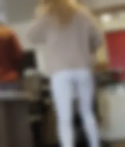 Gorgeous slim blonde in white jeans