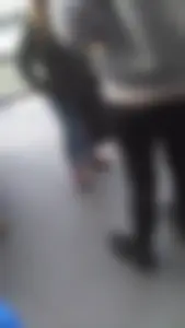 Girl wearing a black skirt over her leggings