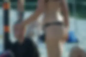 Hot Tattooed Girl in Black Swimsuit Playing Volleyball on the Beach Creepshot Photos Gallery