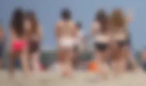 Group of sexy girls on the beach in bikinis with nice bodies