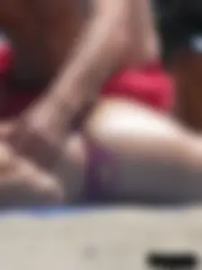 Purple thong topless lady on the beach gets oiled up by her husband