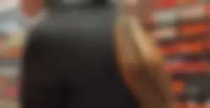Sexy blonde with big ass in shoe store