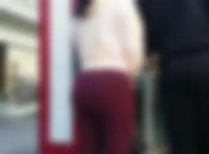 Brunette with a great ass in tight maroon leggings