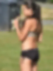 Fit brunette posing in the park. With hoops! [011]