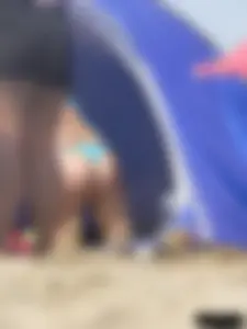 Couple of thick beach teens in little thong bikinis