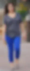 Sexy dog walker in shorts and tank top with friend in blue jeans