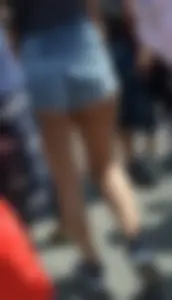 Thick booty babe in denim shorts showing her cheeks