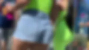 Sexy Latina showing her ass cheeks in little denim shorts and pokies with no bra