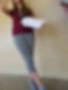 College student in grey leggings almost with camel toe showing