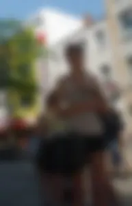 Girl in Mini Shorts with Long Legs on the Street Creepshot
