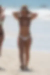 Hot ass candid beach babe in white thong bikini with camel toe