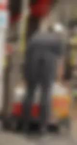 Slim clerk in tight grey jeans