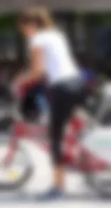 Sexy girl riding a bike in leggings with vtl