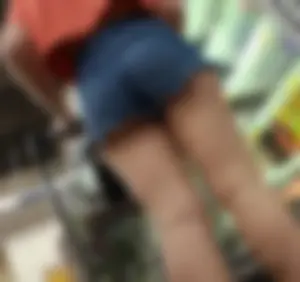 Blonde cheeks in jean shorts with goose bumps