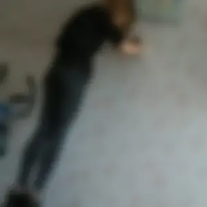 Girl in Skinny Jeans Home Creepshot From Low Angle