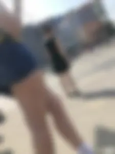 Muscular Legs And Butt in Denim Shorts - Street Creepshots Gallery on a Crosswalk