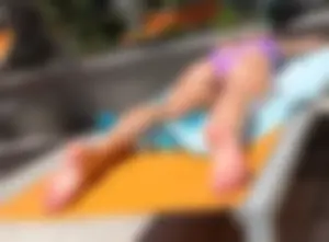 Prone Sunbathing Hottie Laying in Thong Bikini - ass legs and feet on full display (OC)