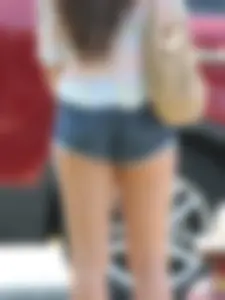 Denim short babe with a wedgie showing some cheeks