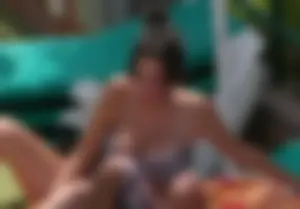 Sexy pool teen with big boobs barely staying in her top