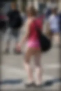 Girl showing serious ass cheeks and great ass in tiny pink shorts