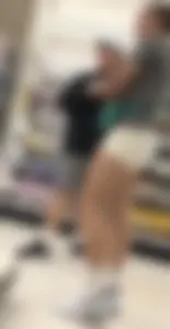 Amazing Asian in white yoga shorts upshot bends squat at Target