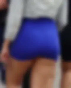 Mixed race woman in spandex shorts outfit