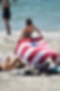 Sexy ass girl with a perfect body in her bikini on the beach
