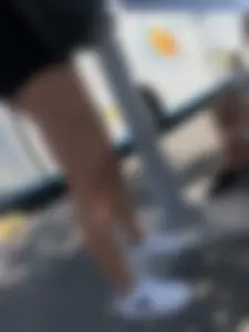 Girls with hot legs waiting at the bus stop