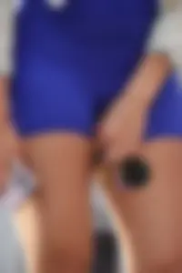 Mixed race woman in spandex shorts outfit